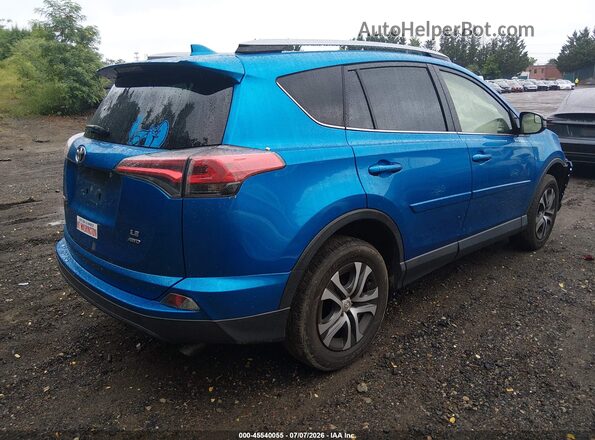 JTMBFREV6JJ215068 2018 TOYOTA RAV4 Blue Rear right