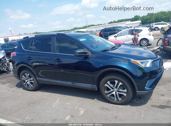 JTMBFREV6JJ220335 2018 TOYOTA RAV4 Blue Vista interior trasera