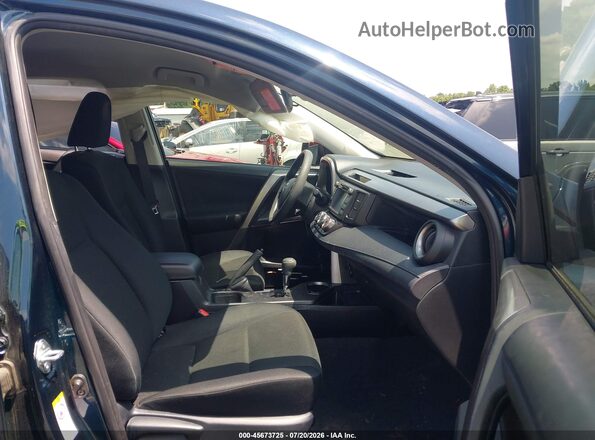 JTMBFREV6JJ220335 2018 TOYOTA RAV4 Blue Vista interior delantera