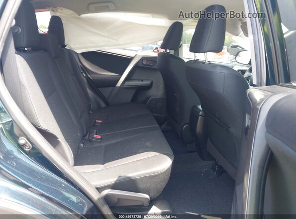 JTMBFREV6JJ220335 2018 TOYOTA RAV4 Blue Vista de la etiqueta del VIN