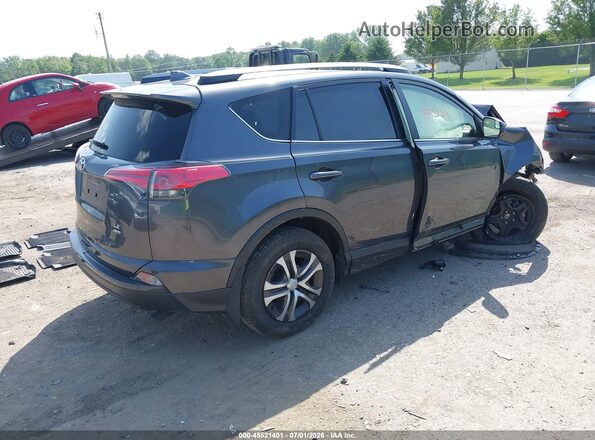 JTMBFREV6JJ249754 2018 TOYOTA RAV4 Gray Trasero derecho