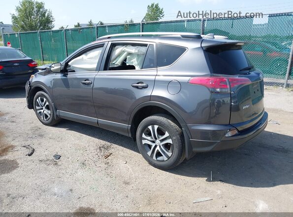 JTMBFREV6JJ249754 2018 TOYOTA RAV4 Gray Trasero izquierdo