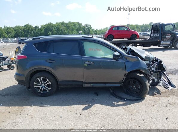 JTMBFREV6JJ249754 2018 TOYOTA RAV4 Gray Vista interior trasera
