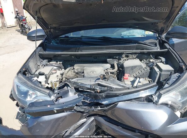 JTMBFREV7GJ077677 2016 TOYOTA RAV4 Blue Հետևի տեսք