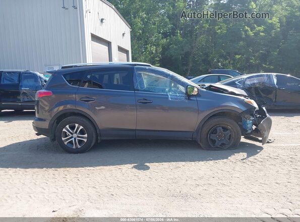 JTMBFREV7GJ077677 2016 TOYOTA RAV4 Blue Սալոնի հետևի տեսք