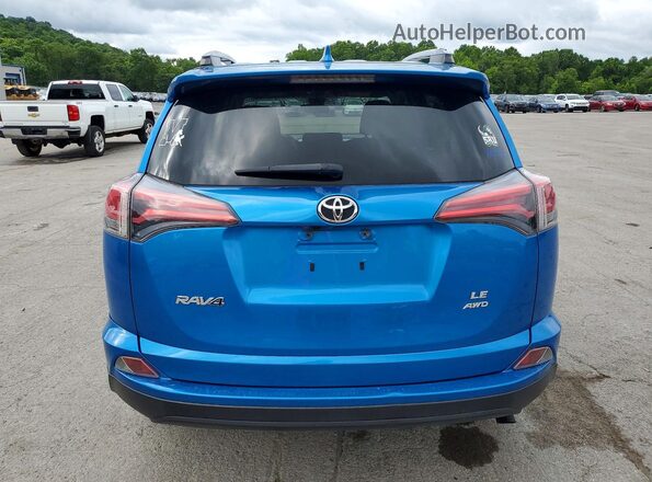 JTMBFREV7JJ180606 2018 TOYOTA RAV4 Blue Vista trasera