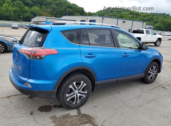 JTMBFREV7JJ180606 2018 TOYOTA RAV4 Blue Trasero derecho