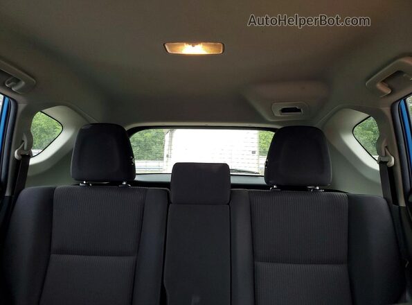 JTMBFREV7JJ180606 2018 TOYOTA RAV4 Blue Vista de los asientos traseros