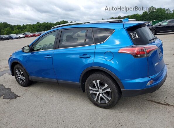 JTMBFREV7JJ180606 2018 TOYOTA RAV4 Blue Trasero izquierdo