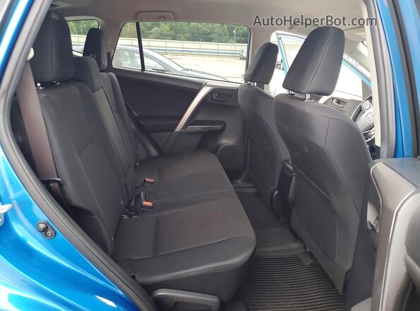JTMBFREV7JJ180606 2018 TOYOTA RAV4 Blue Vista interior trasera