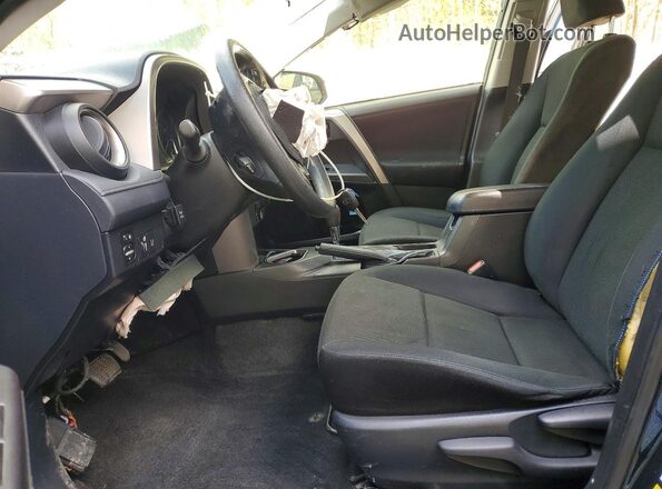 JTMBFREV7JJ234499 2018 TOYOTA RAV4 Blue Vista interior delantera