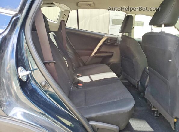 JTMBFREV7JJ234499 2018 TOYOTA RAV4 Blue Vista interior trasera