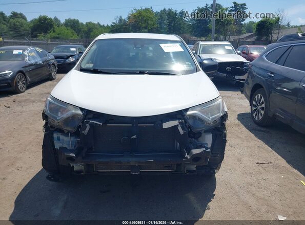 JTMBFREV7JJ723257 2018 TOYOTA RAV4 White Vista interior trasera