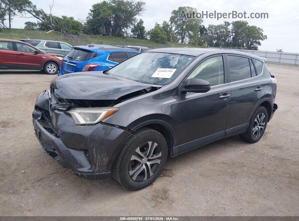 JTMBFREV7JJ727597 2018 TOYOTA RAV4 Gray Front left