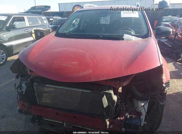 JTMBFREV8HJ127438 2017 TOYOTA RAV4 Красный Вид задней части салона