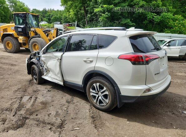 JTMBFREV8HJ710608 2017 TOYOTA RAV4 White Rear left