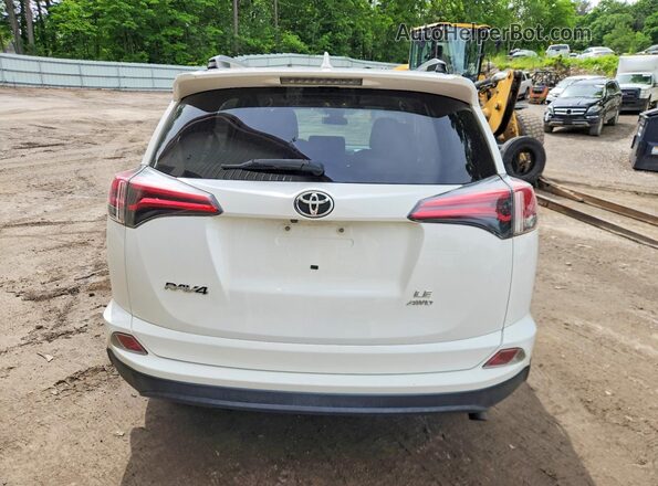 JTMBFREV8HJ710608 2017 TOYOTA RAV4 White Rear view
