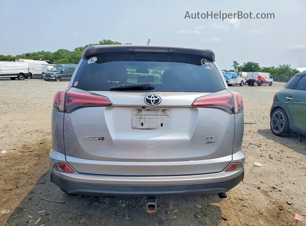 JTMBFREV8JD253688 2018 TOYOTA RAV4 Silver Widok z tyłu