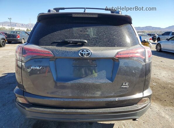 JTMBFREV8JJ717578 2018 TOYOTA RAV4 Gray Rear view