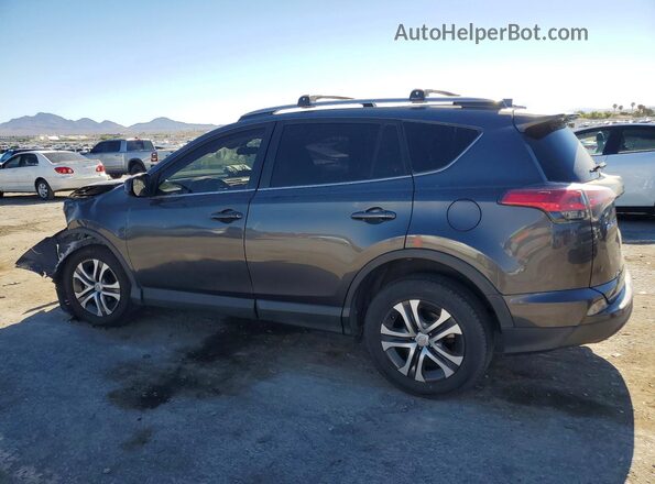 JTMBFREV8JJ717578 2018 TOYOTA RAV4 Gray Rear left