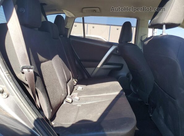 JTMBFREV8JJ717578 2018 TOYOTA RAV4 Gray Rear seats view