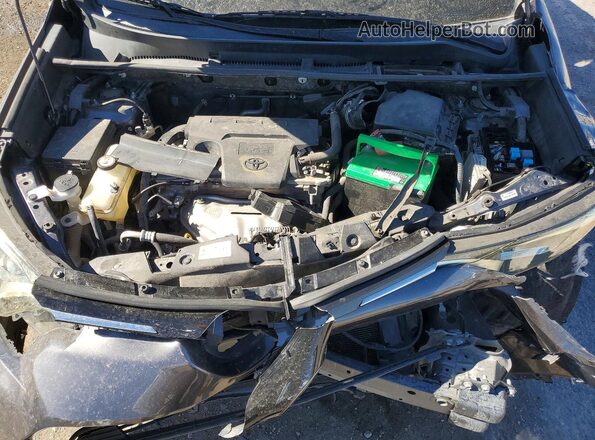 JTMBFREV8JJ717578 2018 TOYOTA RAV4 Gray Rear interior view