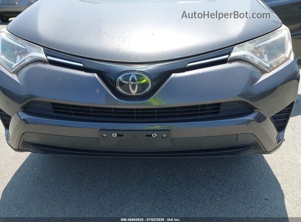 JTMBFREV8JJ730833 2018 TOYOTA RAV4 Gray Front view