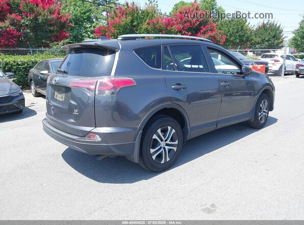 JTMBFREV8JJ730833 2018 TOYOTA RAV4 Gray Rear right