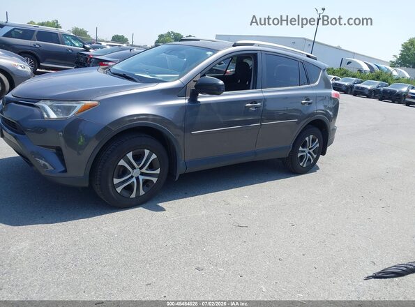 JTMBFREV8JJ730833 2018 TOYOTA RAV4 Gray Front left