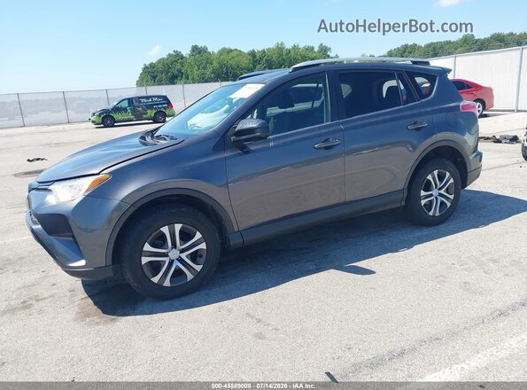 JTMBFREV9GJ086042 2016 TOYOTA RAV4 Gray Vista tres cuartos delantera izquierda