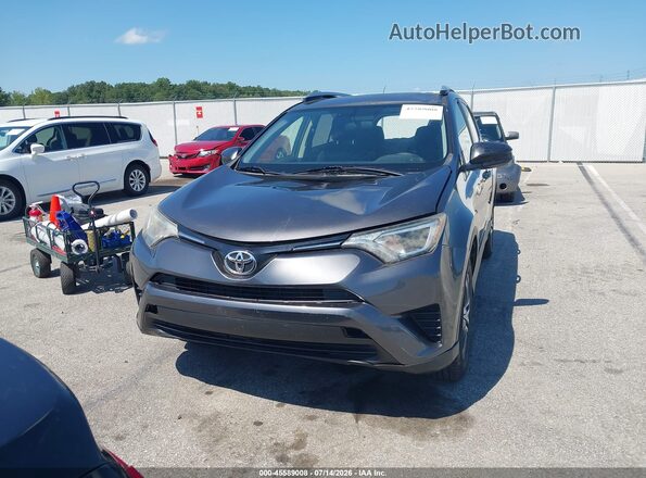 JTMBFREV9GJ086042 2016 TOYOTA RAV4 Gray Vista del cuadro de instrumentos