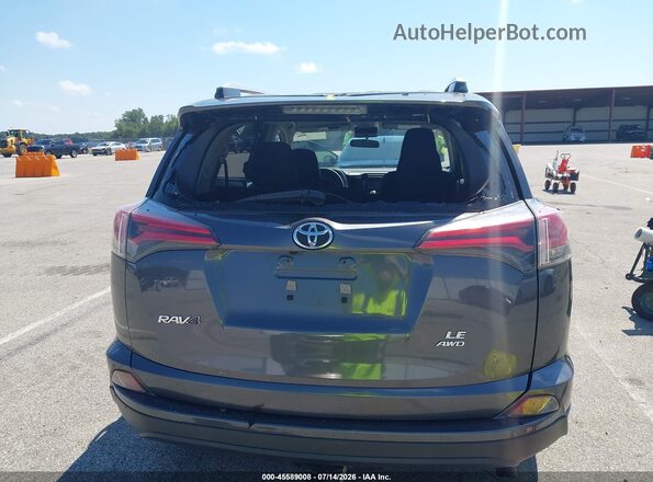 JTMBFREV9GJ086042 2016 TOYOTA RAV4 Gray 