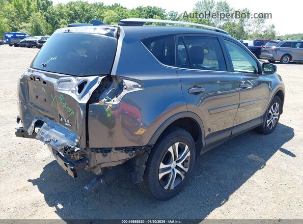 JTMBFREV9HJ140652 2017 TOYOTA RAV4 Gray Rear right