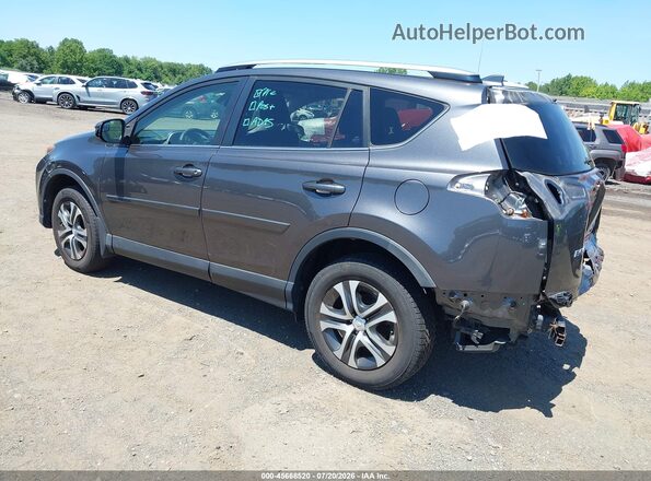 JTMBFREV9HJ140652 2017 TOYOTA RAV4 Gray Rear left