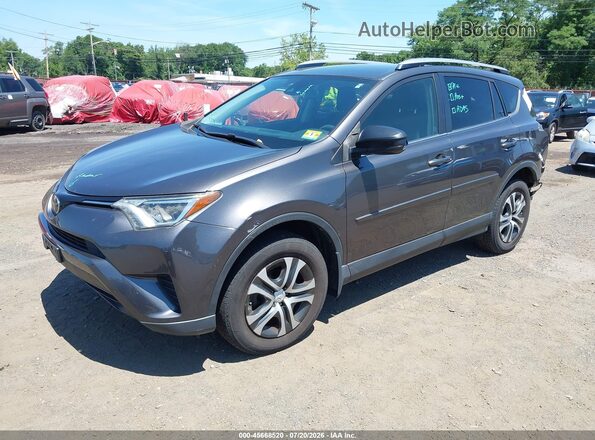JTMBFREV9HJ140652 2017 TOYOTA RAV4 Gray Front left