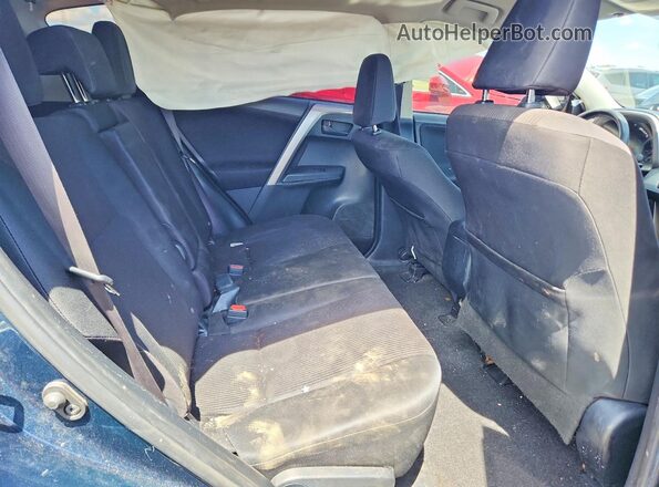 JTMBFREV9JJ735829 2018 TOYOTA RAV4 Blue Rear seats view
