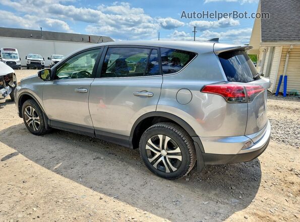 JTMBFREVXJJ260286 2018 TOYOTA RAV4 Silver Задня ліва чверть