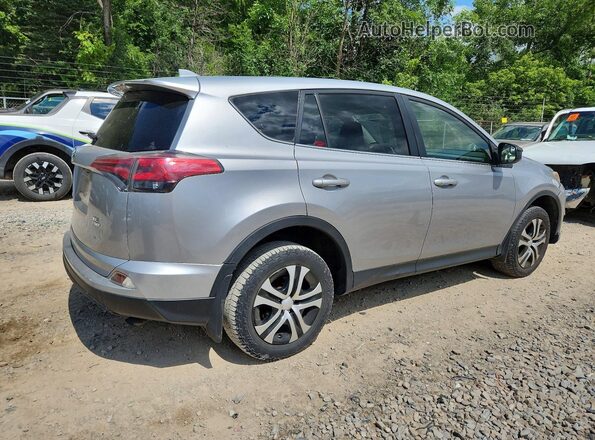 JTMBFREVXJJ260286 2018 TOYOTA RAV4 Silver Задня права чверть