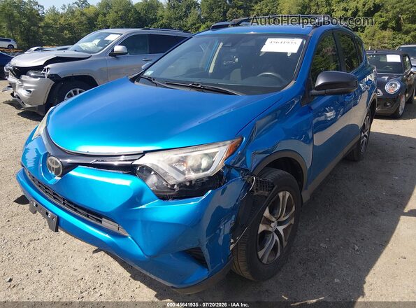 JTMBFREVXJJ734138 2018 TOYOTA RAV4 Blue Front view