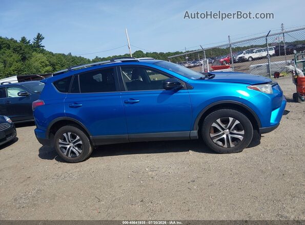 JTMBFREVXJJ734138 2018 TOYOTA RAV4 Blue Rear interior view