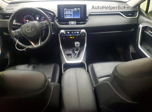 JTMC1RFV0KD017118 2019 TOYOTA RAV4 White Dashboard view