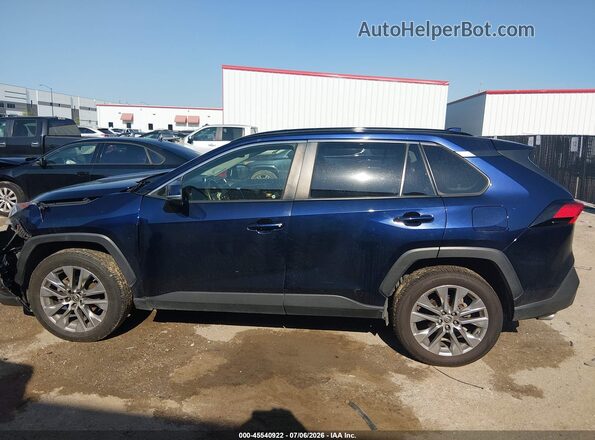 JTMC1RFV3KD004332 2019 TOYOTA RAV4 Dark Blue უკანა სალონის ხედი