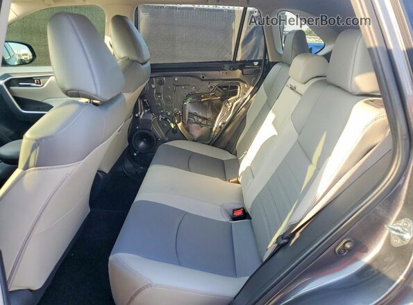 JTMC1RFV4PD099703 2023 TOYOTA RAV4 Gray Вид задньої частини салону