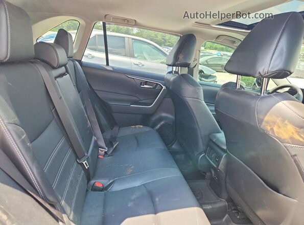 JTMC1RFV7PJ026780 2023 TOYOTA RAV4 Silver Вид задньої частини салону