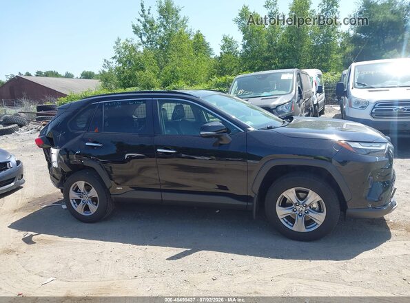 JTMD6RFV5PD101044 2023 TOYOTA RAV4 HYBRID Black Vista interior trasera
