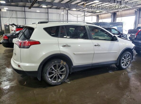 JTMDFREV0HJ164346 2017 TOYOTA RAV4 White Rear right
