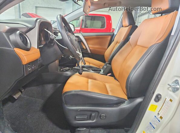 JTMDFREV0HJ164346 2017 TOYOTA RAV4 White Front interior view