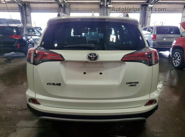JTMDFREV0HJ164346 2017 TOYOTA RAV4 White Rear view