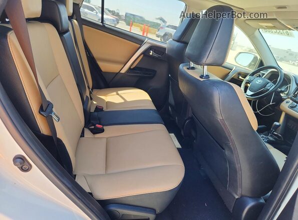 JTMDFREV0JJ240265 2018 TOYOTA RAV4 White უკანა სალონის ხედი