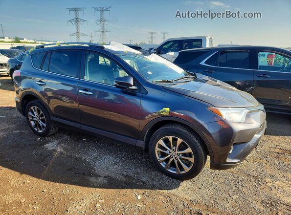 JTMDFREV1JJ735025 2018 TOYOTA RAV4 Gray Delantero derecho